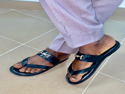 Person wearing handcrafted Ilisabawn leather slippers comfortably