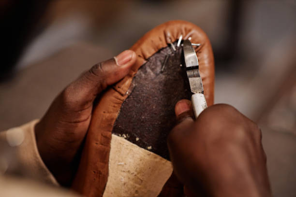 Close-up of handmade shoe process
